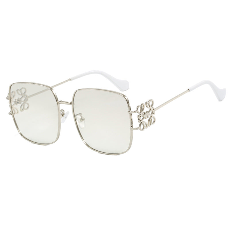 Women's square sunglasses with filigree design and luxurious metal frame Skanto