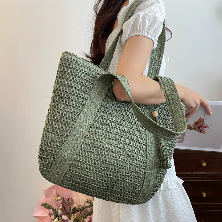 Elegant crossover bag made of braided straw Skanto