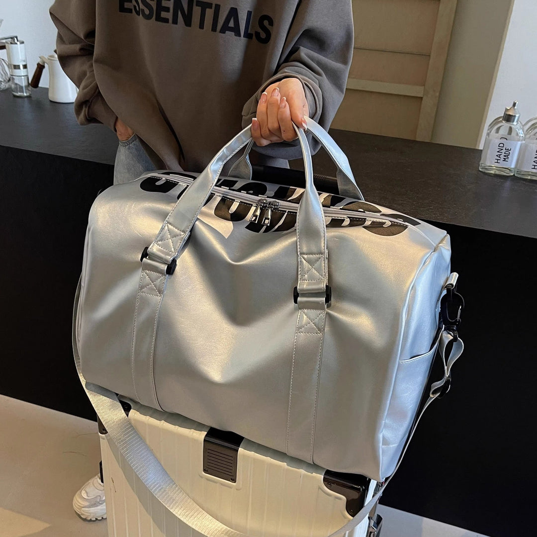 Sporty reiseveske med robust design og justerbar skulderstropp Skanto