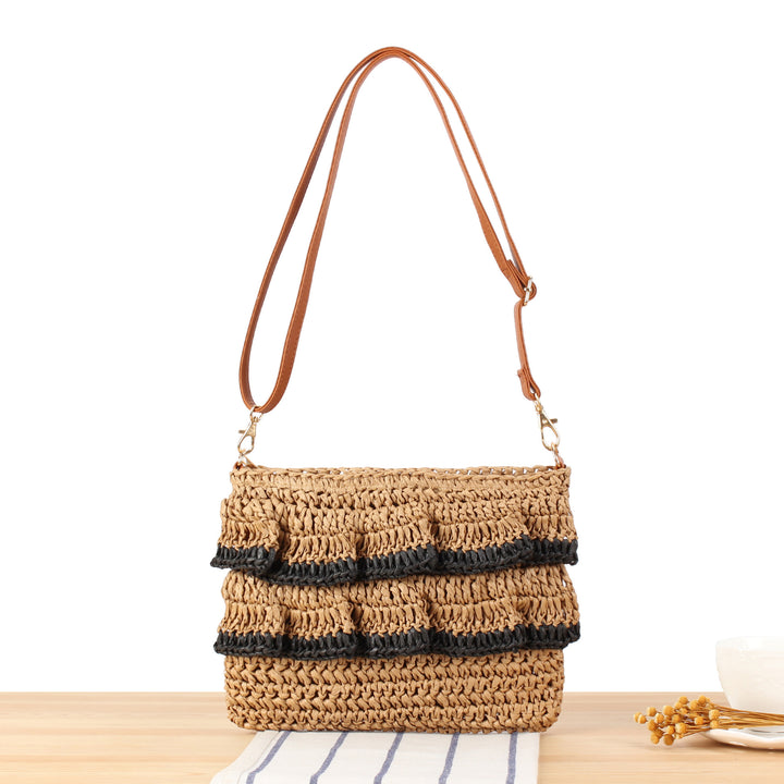 Ruffle design handbag made of braided raffia Skanto