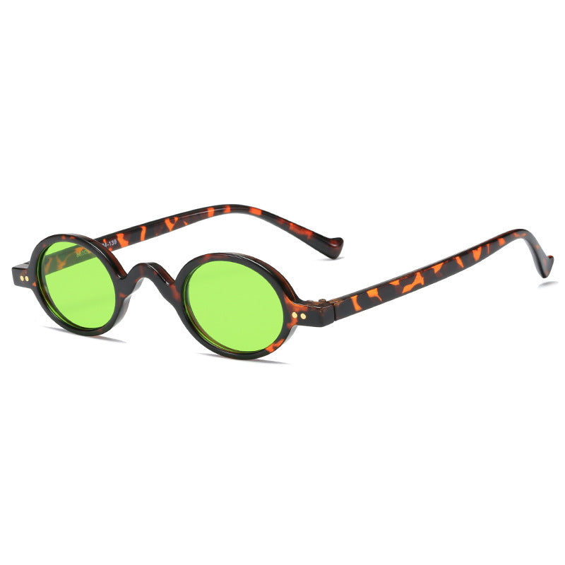 Dame rund solbrille i retrostil Skanto