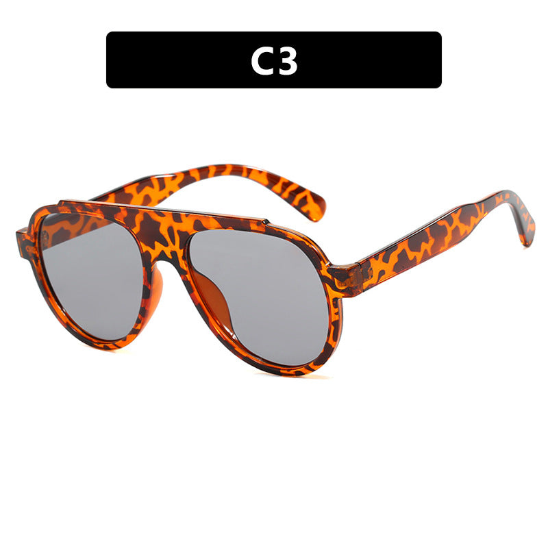 Women's stylish black sunglasses in modern design Skanto