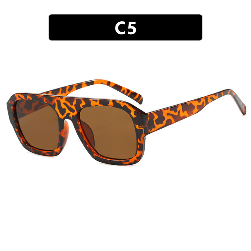 Dame oversized solbrille med markant rektangulært ramme Skanto