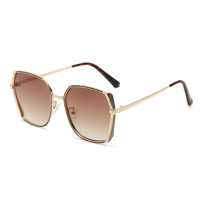 Dame stor og elegant solbrille Skanto