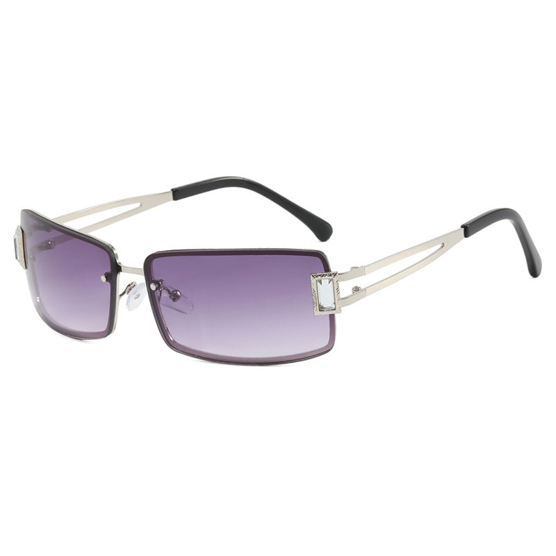 Stylish women's sunglasses with elegant trapezoidal lenses and filigree metal frame Skanto
