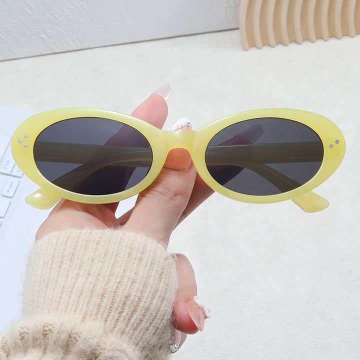 Damer moteriktig solbrille i elegant ovalt design Skanto