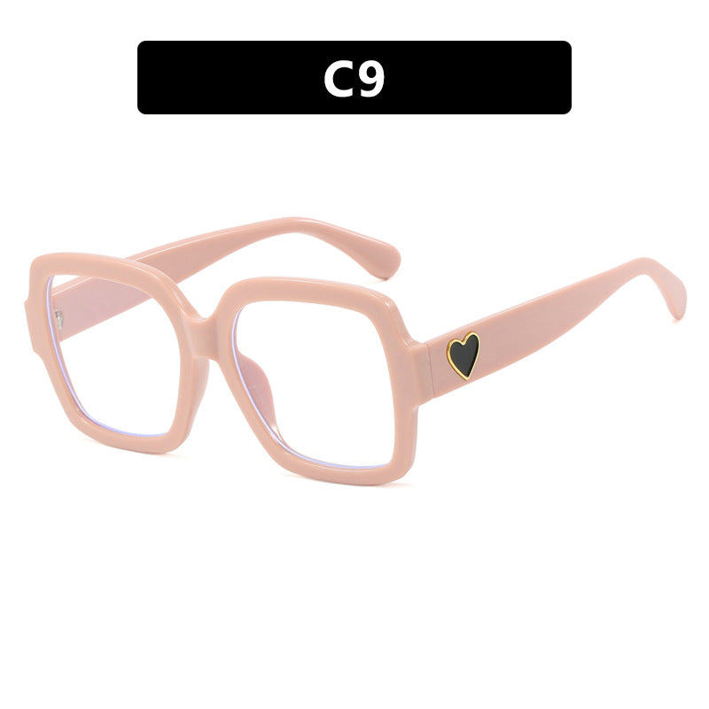 Dame firkantet solbrille med leken hjerte detalj Skanto
