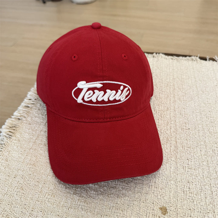 Herresportcaps med tennisgrafikk Skanto