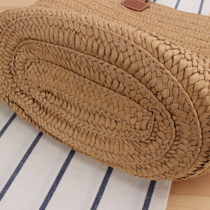 Elegant shoulder bag made of natural raffia with high-quality leather accents Skanto