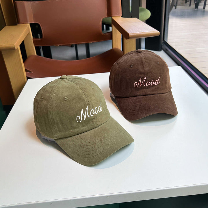 Kvinnenes broderte statement caps Skanto