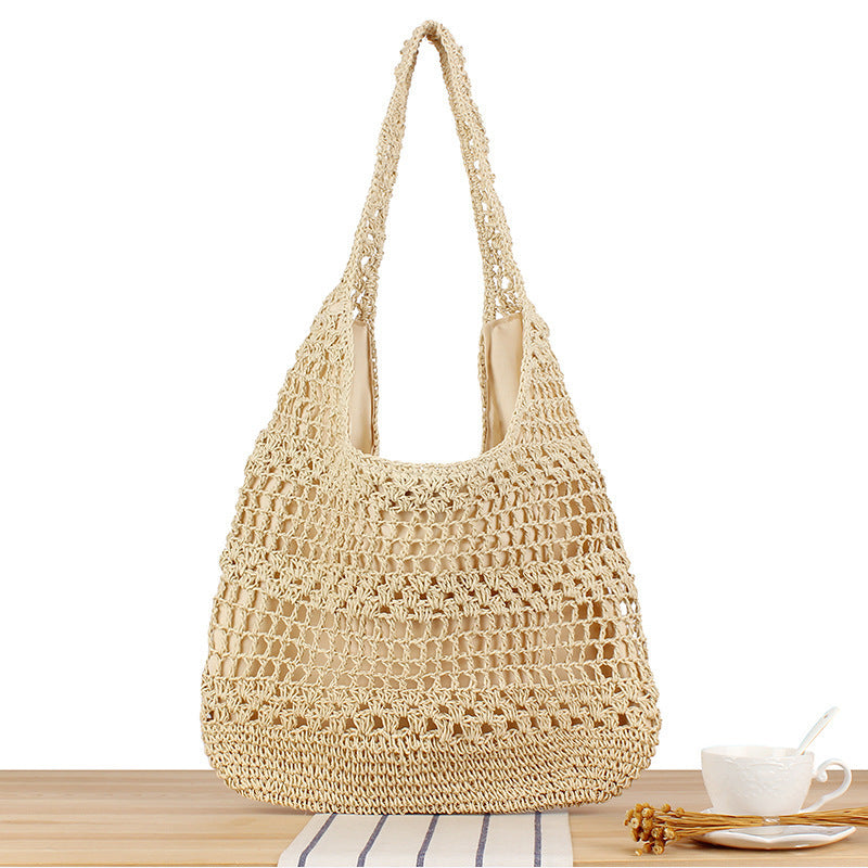 Handbag with floral appliqué in natural material Skanto