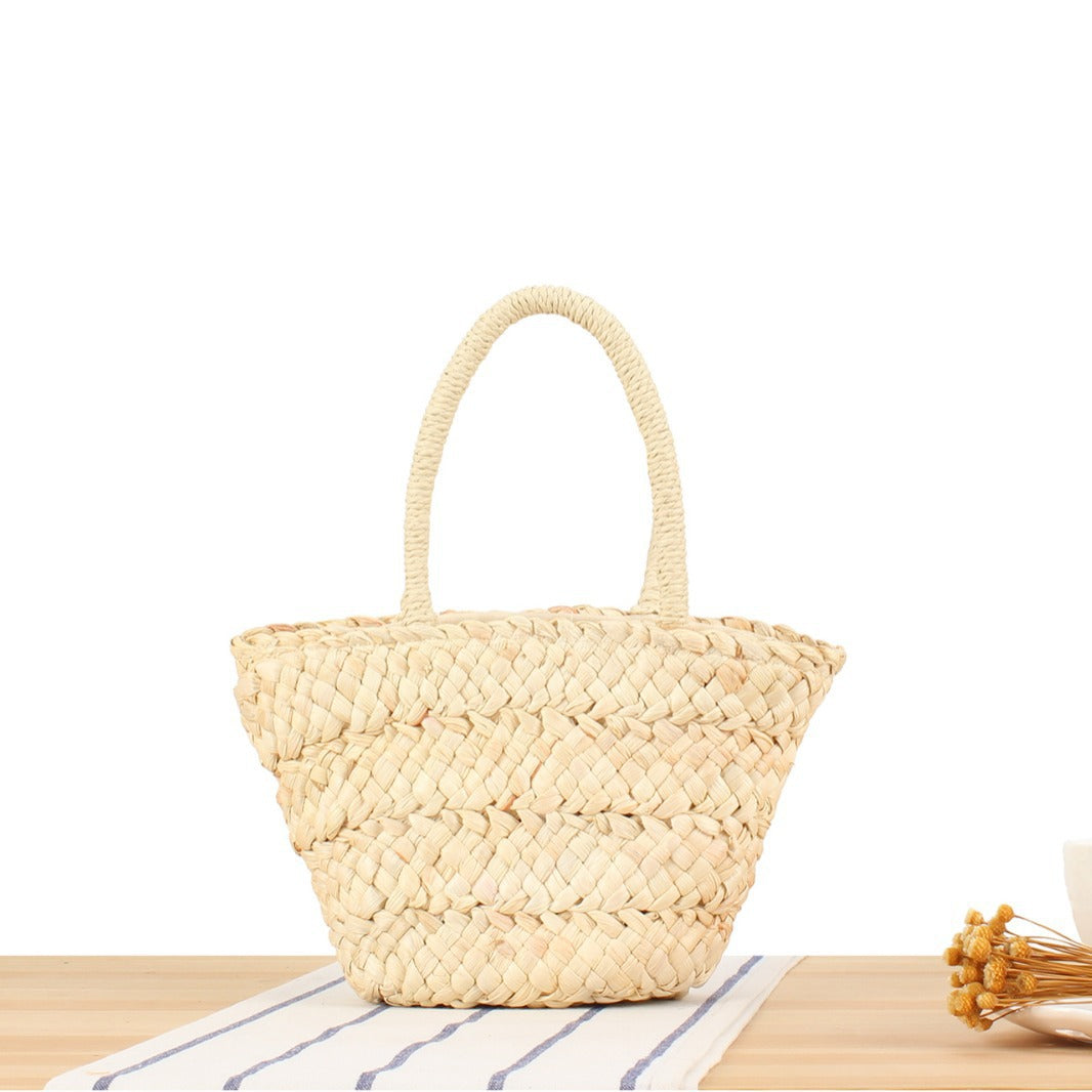 Handbag made of natural woven material Skanto