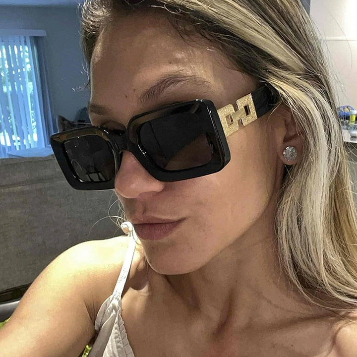 Women's fashionable sunglasses in elegant square design with luxurious gold details Skanto