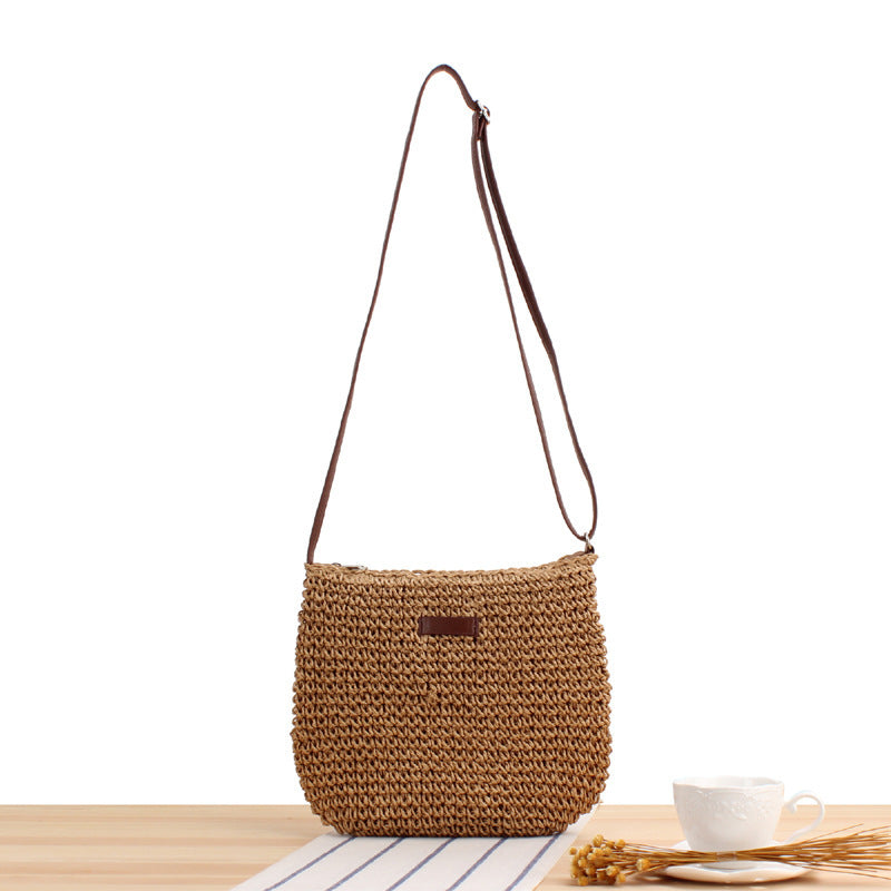 Shoulder bag in woven natural material with detachable leather strap Skanto
