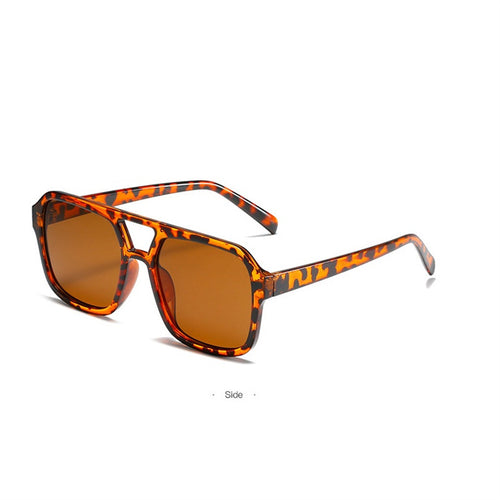 Dame modische Oversized-solbrille med iøynefallende mønster Skanto