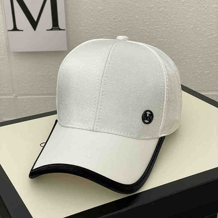 Kvinnenes skinnende sateng baseballcap Skanto