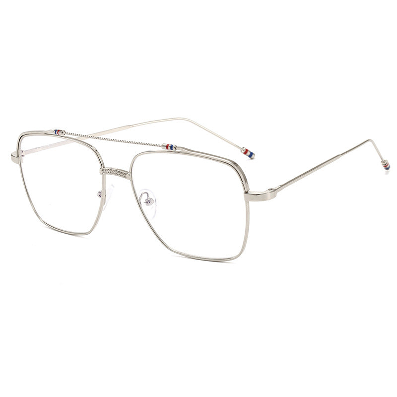 Dame moteriktig buet brille med smal metallramme Skanto