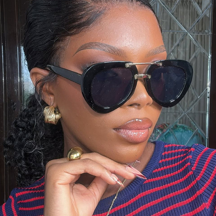 Women's extravagant sunglasses in modern heart design Skanto