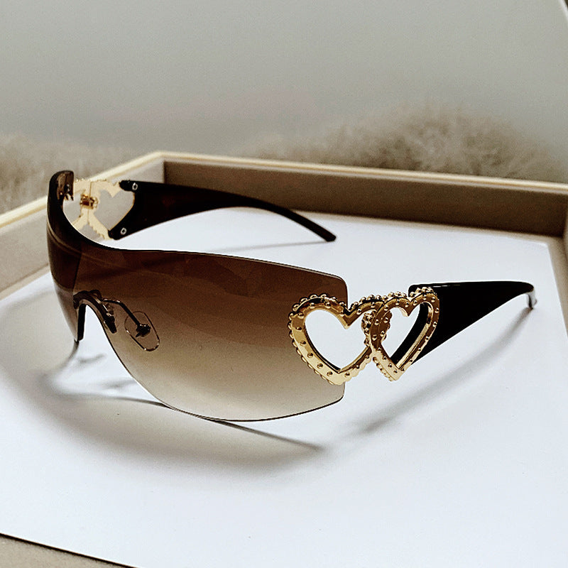 Dame designer-solbrille med luksuriøs hjerte-akseent Skanto