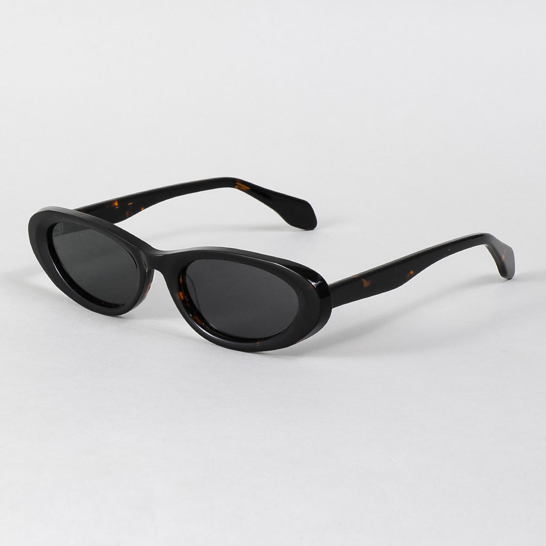 Dame designer solbriller i moderne oval design Skanto