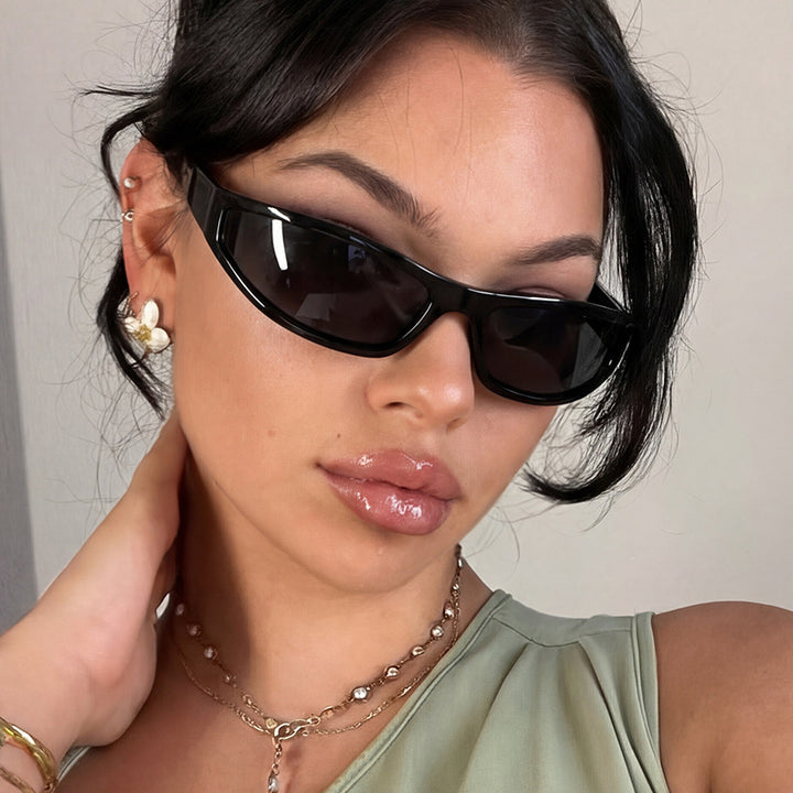 Women's sports sunglasses with a flat, aerodynamic design and UV protection Skanto