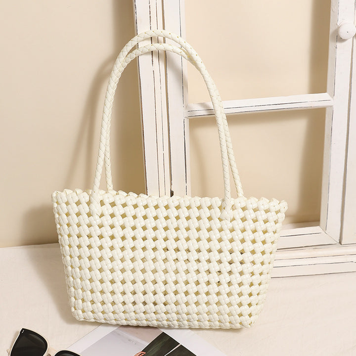 Braided beach bag with practical folding mechanism Skanto