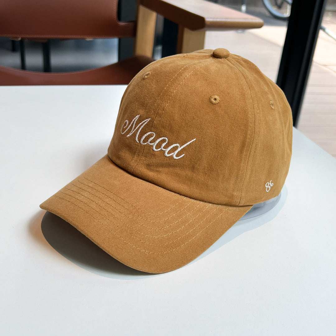 Kvinnenes broderte statement caps Skanto