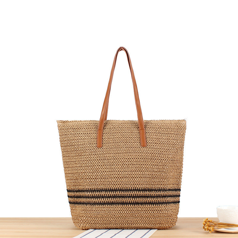 Stylish beach bag made of natural weave with leather handles Skanto