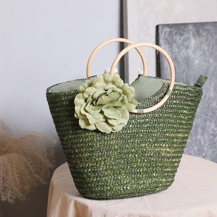 Håndveske med blomsterdetaljer Skanto