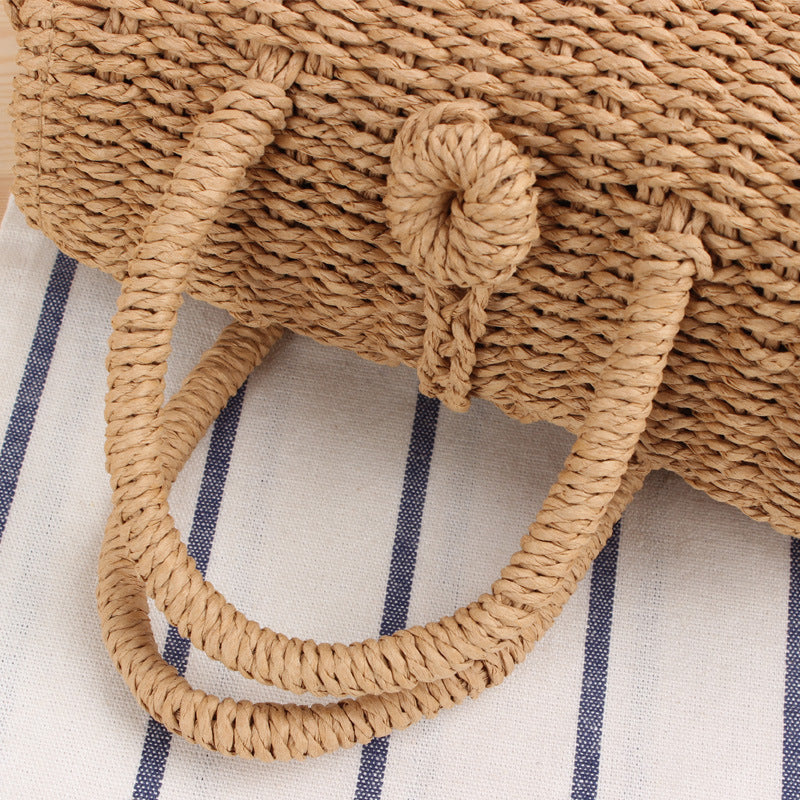 Woven natural material handbag with practical shoulder strap Skanto