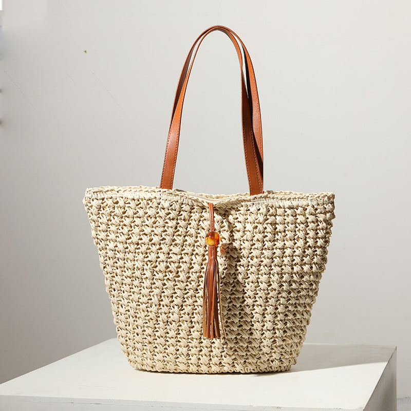 Handmade basket bag with stylish fringe details Skanto