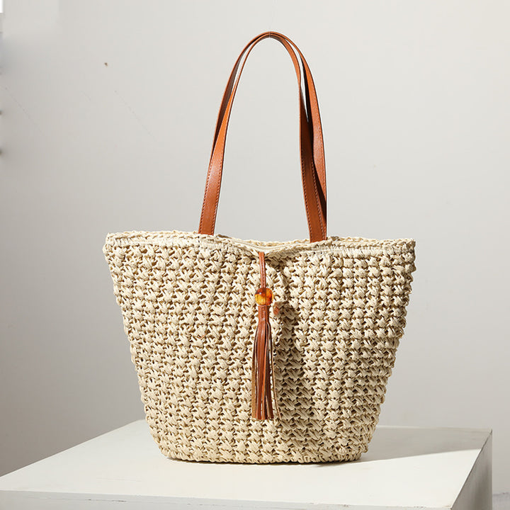 Handmade basket bag with stylish fringe details Skanto