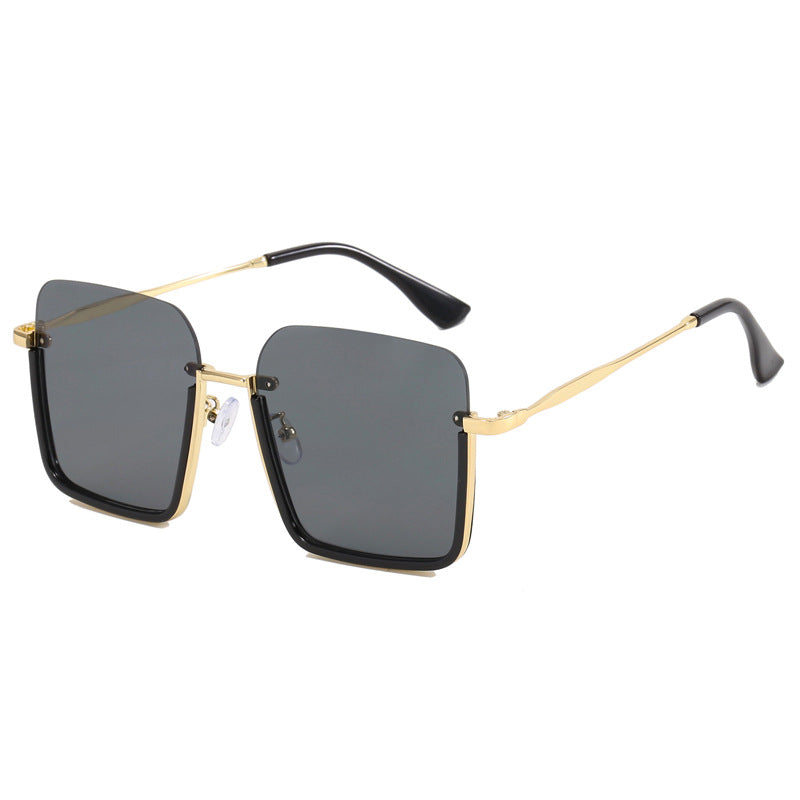 Dame oversized solbrille med elegant geometrisk ramme Skanto