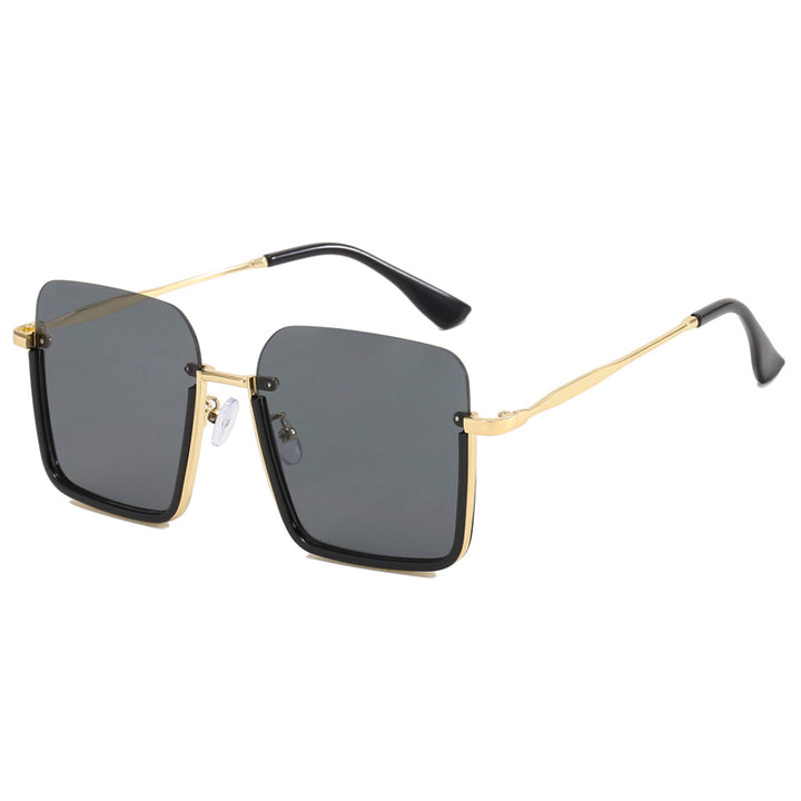 Dame oversized solbrille med elegant geometrisk ramme Skanto