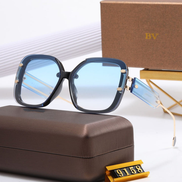 Dame designer-solbrille med ekstravagant ramme Skanto