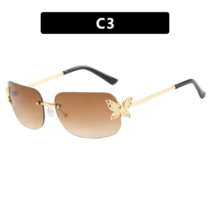 Women's fashionable sunglasses with filigree butterfly design and protective lenses Skanto