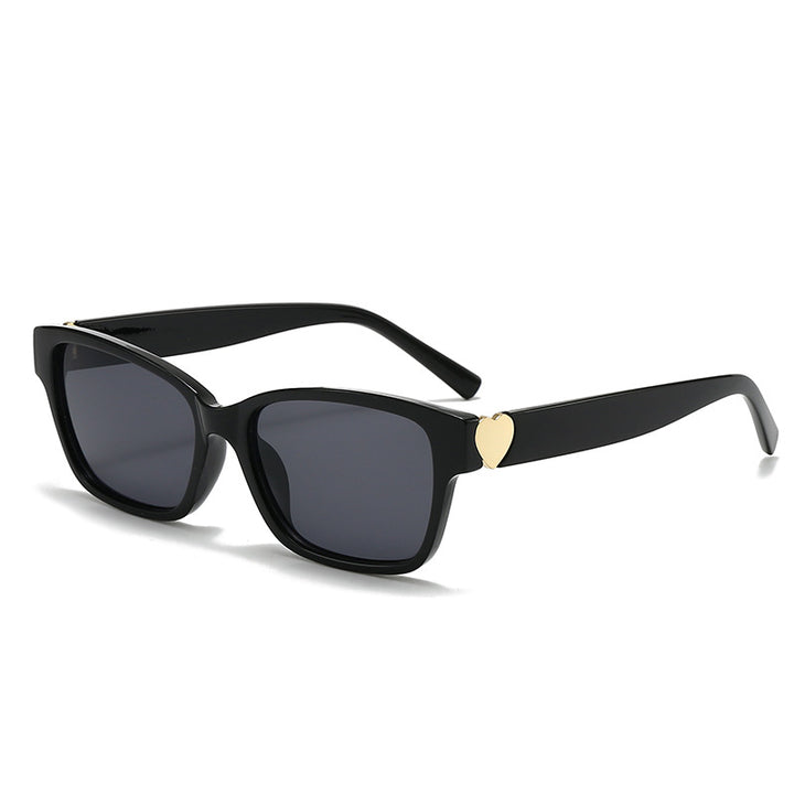 Dame moterik kvadratisk solbrille med hjerte-senter Skanto