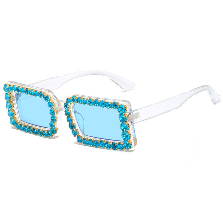 Dame moteriktig solbrille med glitrende rammedekorasjon Skanto