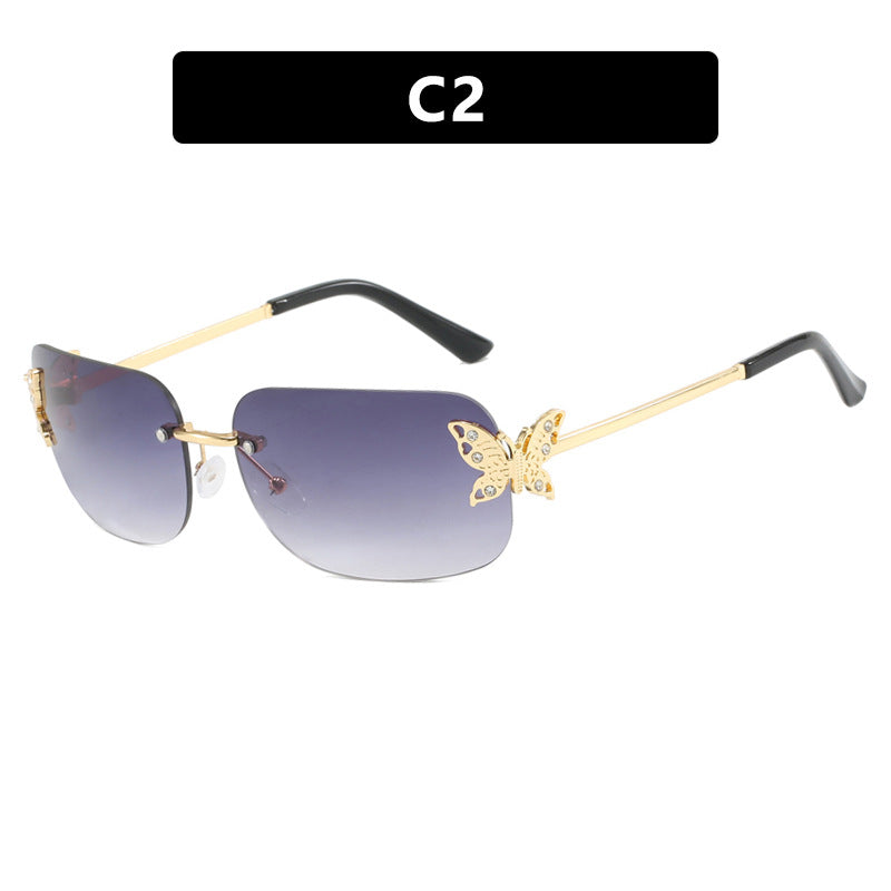 Women's fashionable sunglasses with filigree butterfly design and protective lenses Skanto