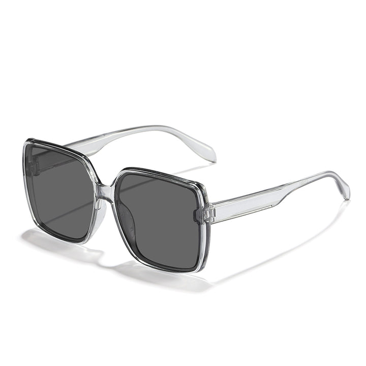 Dame oversized solbrille med moderne kvadratisk ramme og beskyttende glass Skanto
