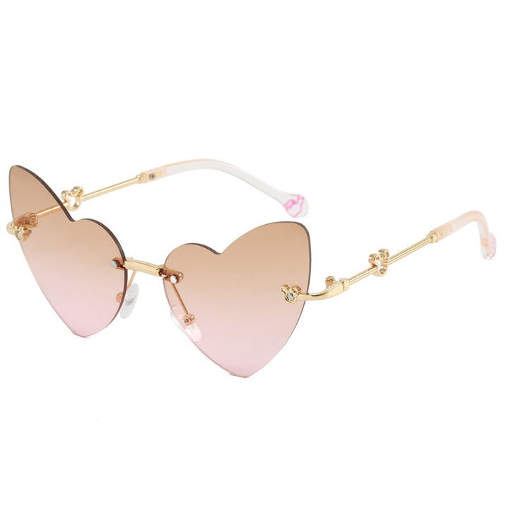 Damer hjerteformet solbrille med dekorert ramme Skanto