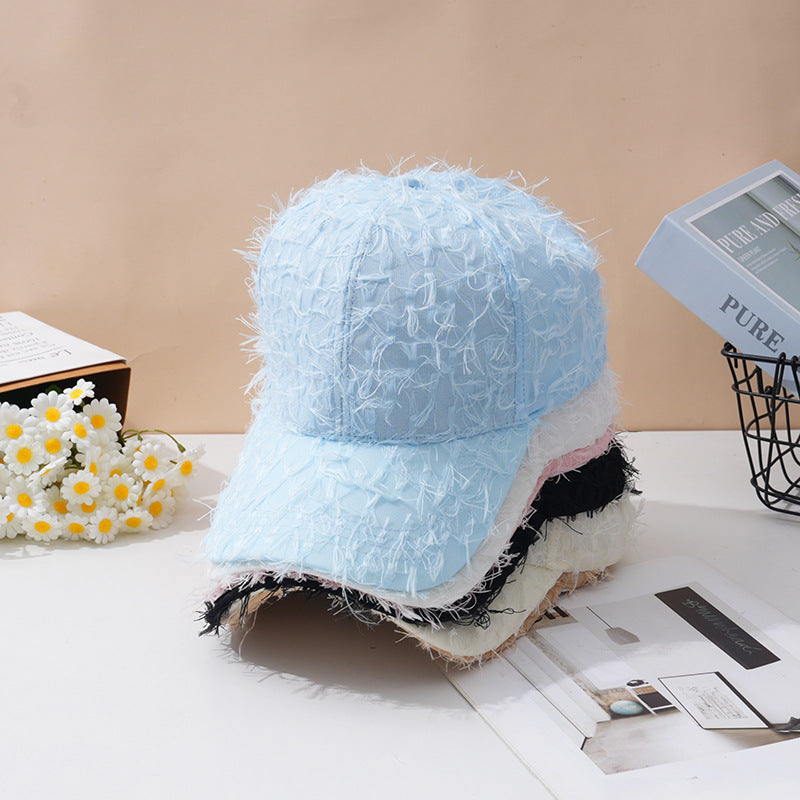 Kvinnebrodert teksturert baseballcap Skanto