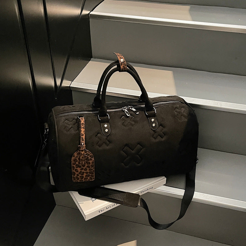 Sporty reiseveske med trendy design og praktiske rom Skanto