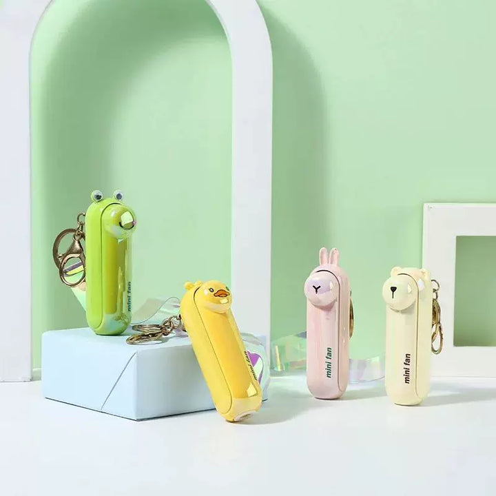 Unisex enhetsstørrelse oppladbar nøkkelring håndholdt mini-vifte med håndleddsstropp og ny art frosk charm Skanto