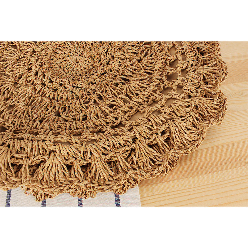 Hand-knotted beach bag with artistic round design Skanto
