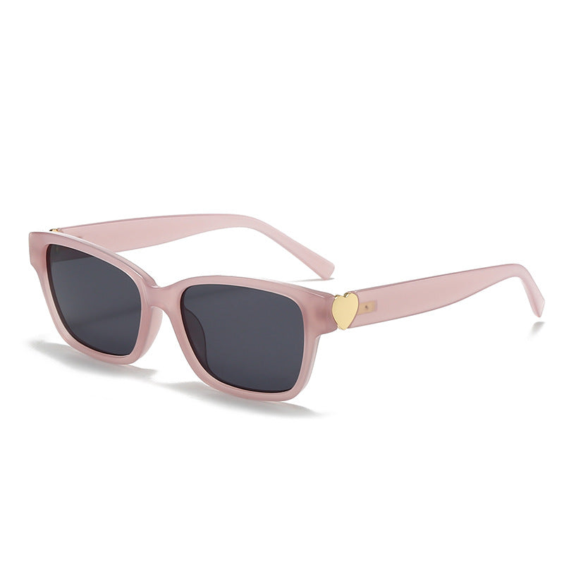 Dame moterik kvadratisk solbrille med hjerte-senter Skanto