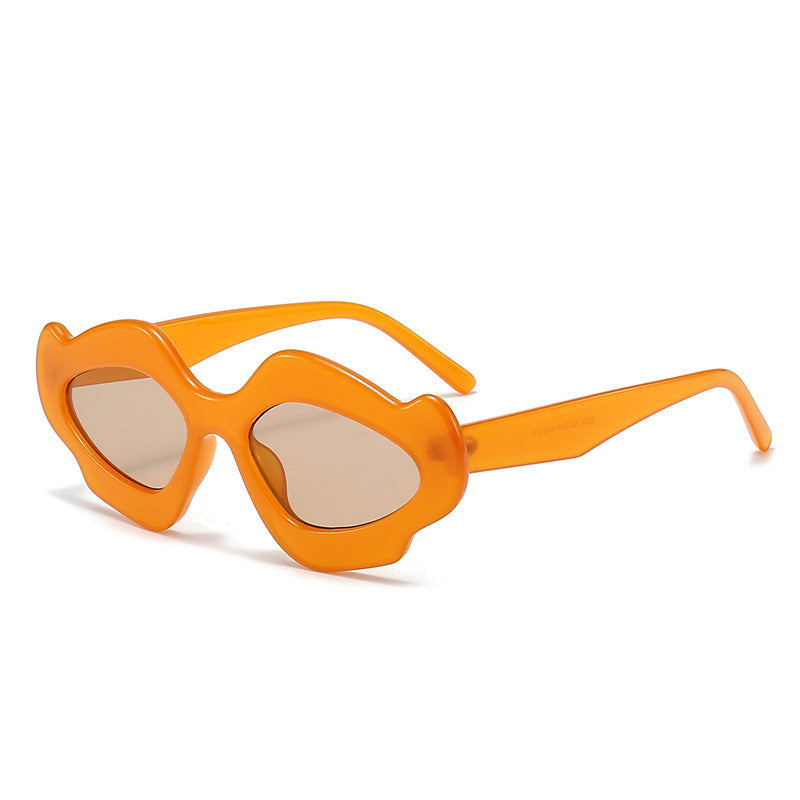Dame moteriktig solbrille med unik blomsterramme Skanto