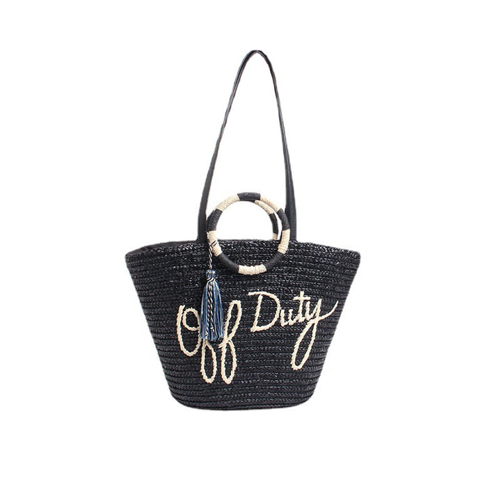 Designer Straw Bag with Playful Text and Decorative Pom Pom Skanto