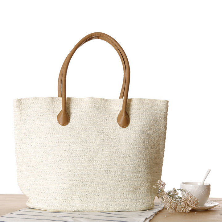 Spacious straw shopper with leather handles Skanto