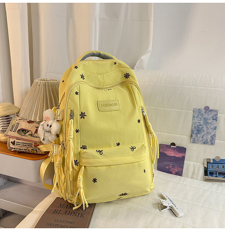 Elegant brodert skole ryggsekk
